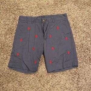 Blue khaki shorts with crawfish on them
